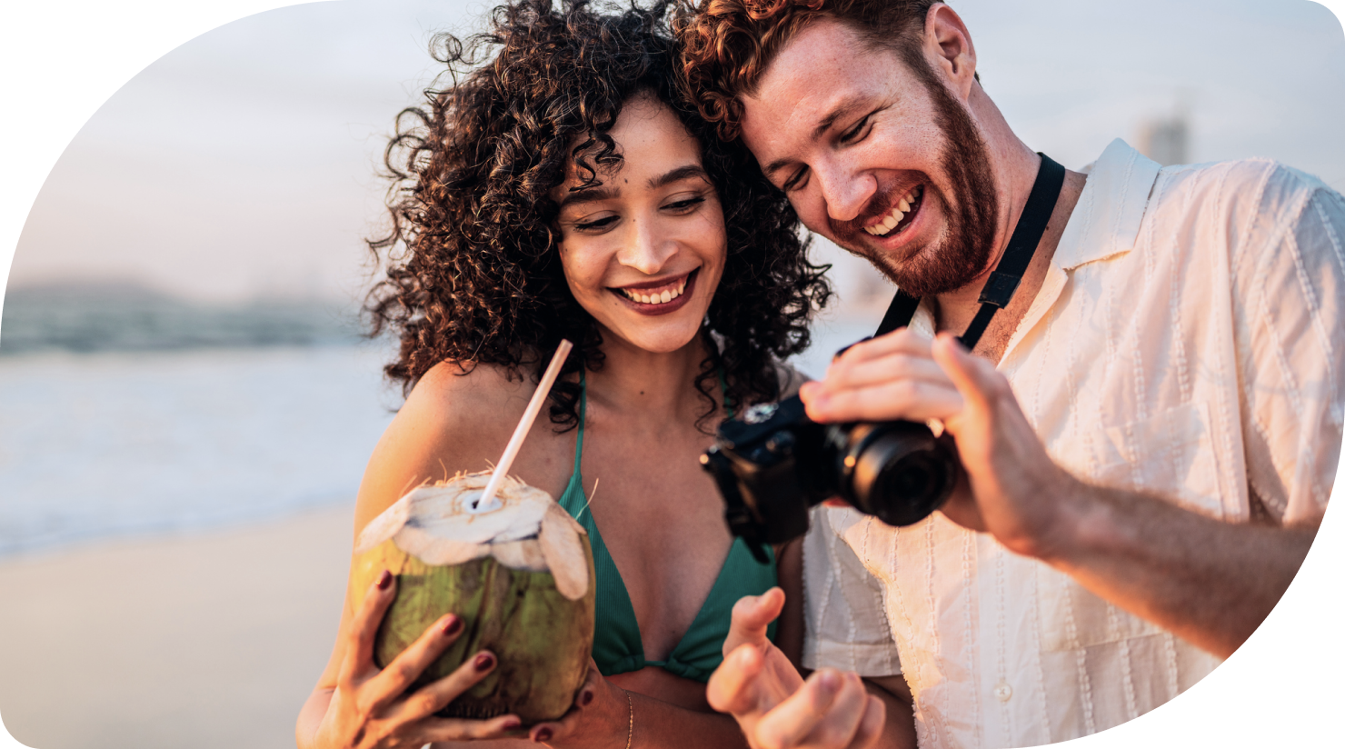 Couple on the beach enjoying their trip